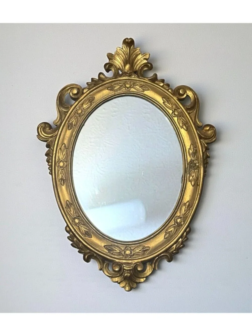 Ornate Gold Oval Mirror With Floral Details & Vintage Frame Design